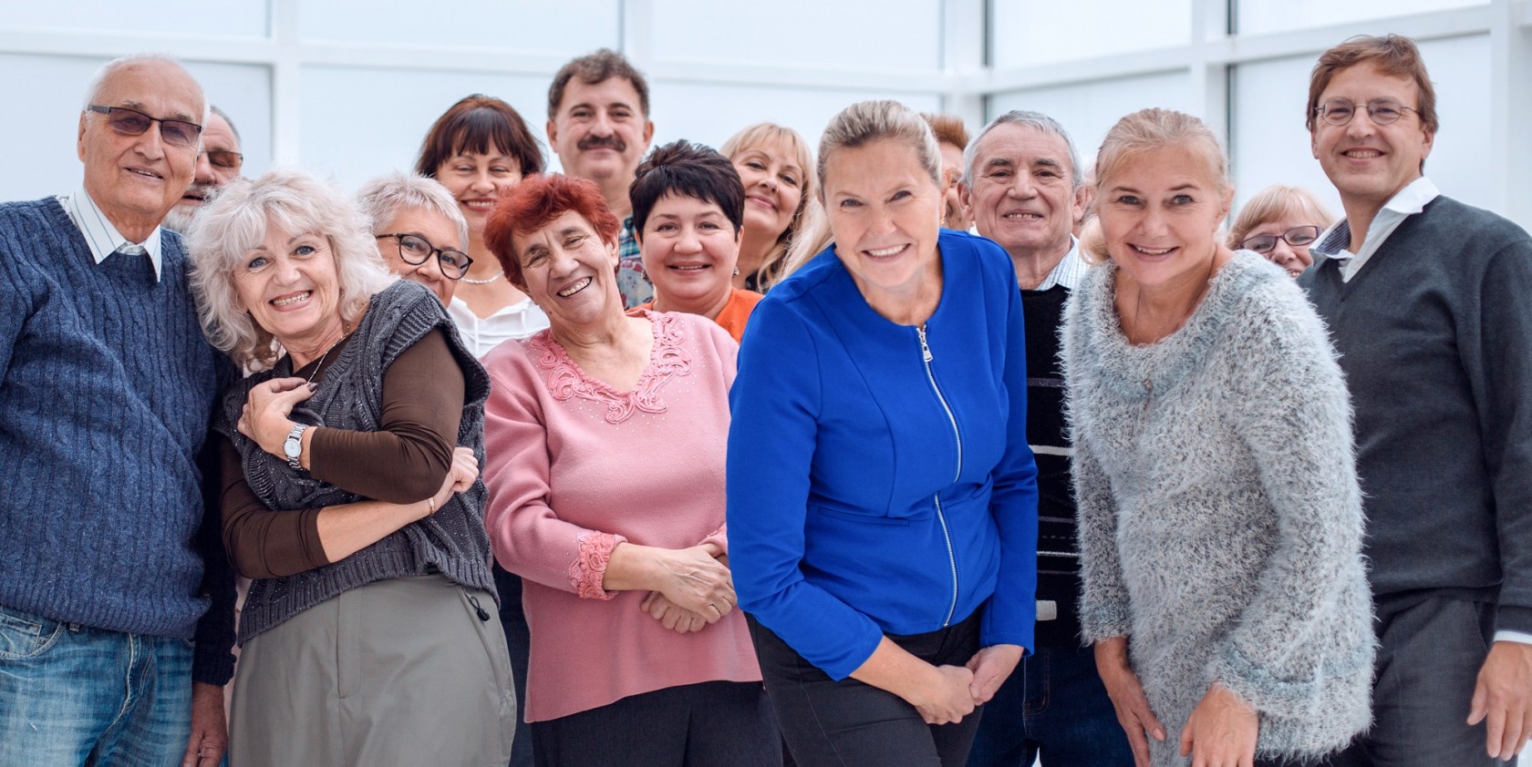 Portrait Of Senior Friends Hiking In Countryside